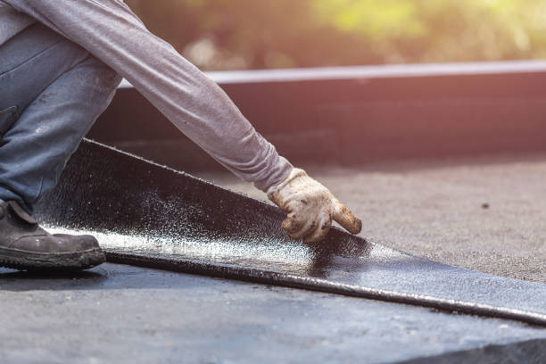 Professional Exterior Waterproofing technician working in Holton, MI